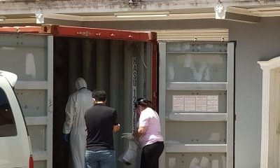 Contenedores donde fueron hallados los cuerpos. Foto Judiciales.