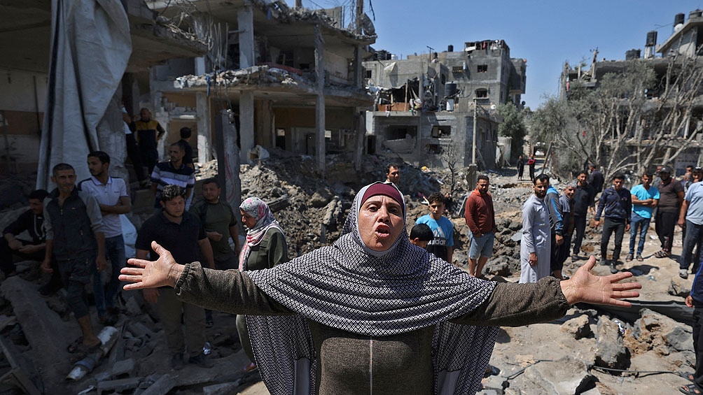 Palestinos huyen de sus hogares. Foto: Télam.