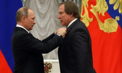 Presidente de Rusia, Vladímir Putin y el violinista, Sergei Roldugin. Foto: Infobae