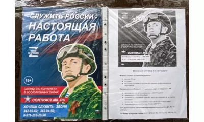 Este anuncio para reclutar soldados fue colgado en la puerta de un consultorio médico en San Petersburgo. Dice: "¡Servir a Rusia es el verdadero trabajo!". Foto: BBC Mundo.
