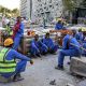 Trabajadores migrantes en las obras para el Mundial de Fútbol de la FIFA en Qatar 2022. Foto: DW.