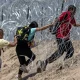 Migrantes en la frontera entre EE. UU. y México, en El Paso, Texas. Foto: DW.