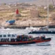 Migrantes llegan a Lampedusa. Foto: DW.