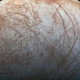 Europa es conocida como la "luna helada", y hasta ahora se había pensado que la presencia de hielo equivaldría a la de oxígeno en grandes cantidadesImagen: NASA/JPL-Cal