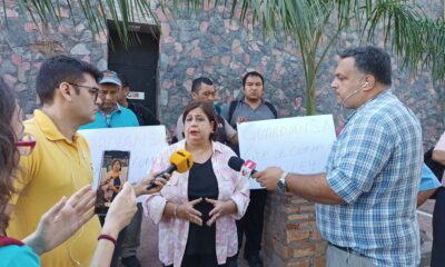 Esperanza Martínez junto a trabajadores de seguridad. Foto: Gentileza.