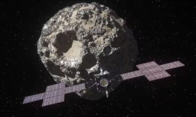 Ilustración conceptual del artista que representa la nave espacial de la misión Psyche de la NASA cerca del objetivo de la misión, el asteroide metálico Psyche. (NASA/JPL-Caltech/ASU via AP)