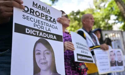 Manifestantes exigen la liberación de los presos políticos en Venezuela. Imagen: Juan Barreto/AFP/Getty Images/DW