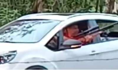 Captura del video que se viralizó del hombre con rifle amenazando a los vecinos.